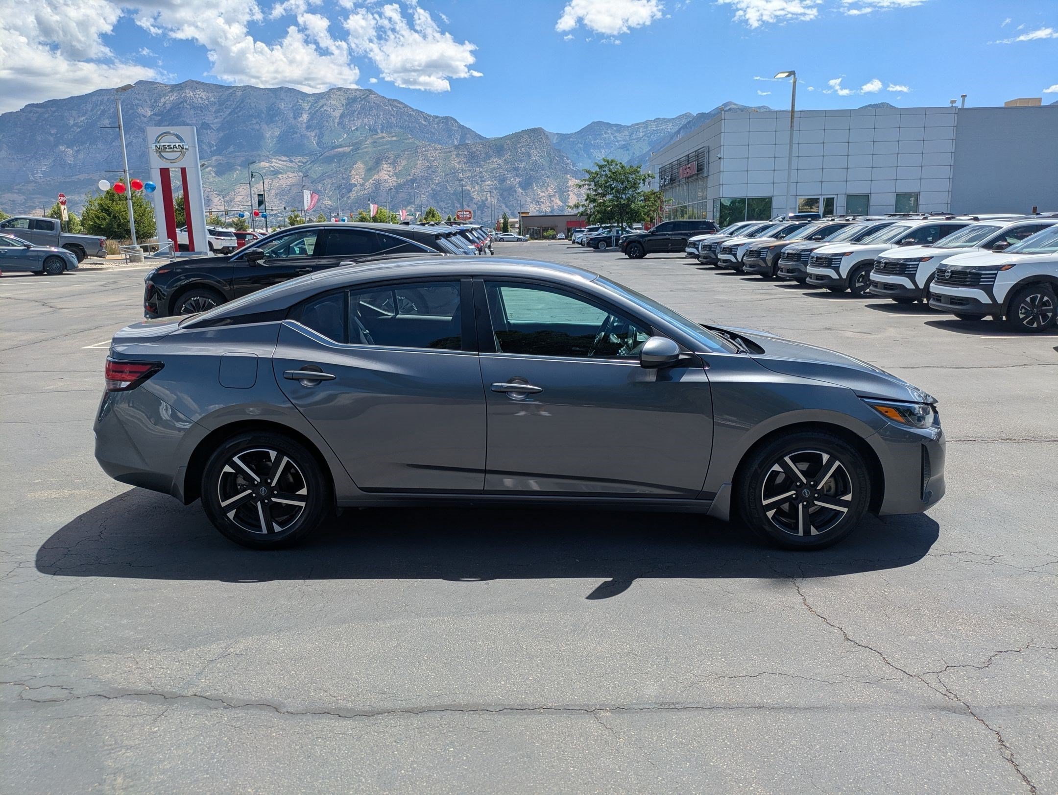 Used 2024 Gun Metallic Nissan SV image 2