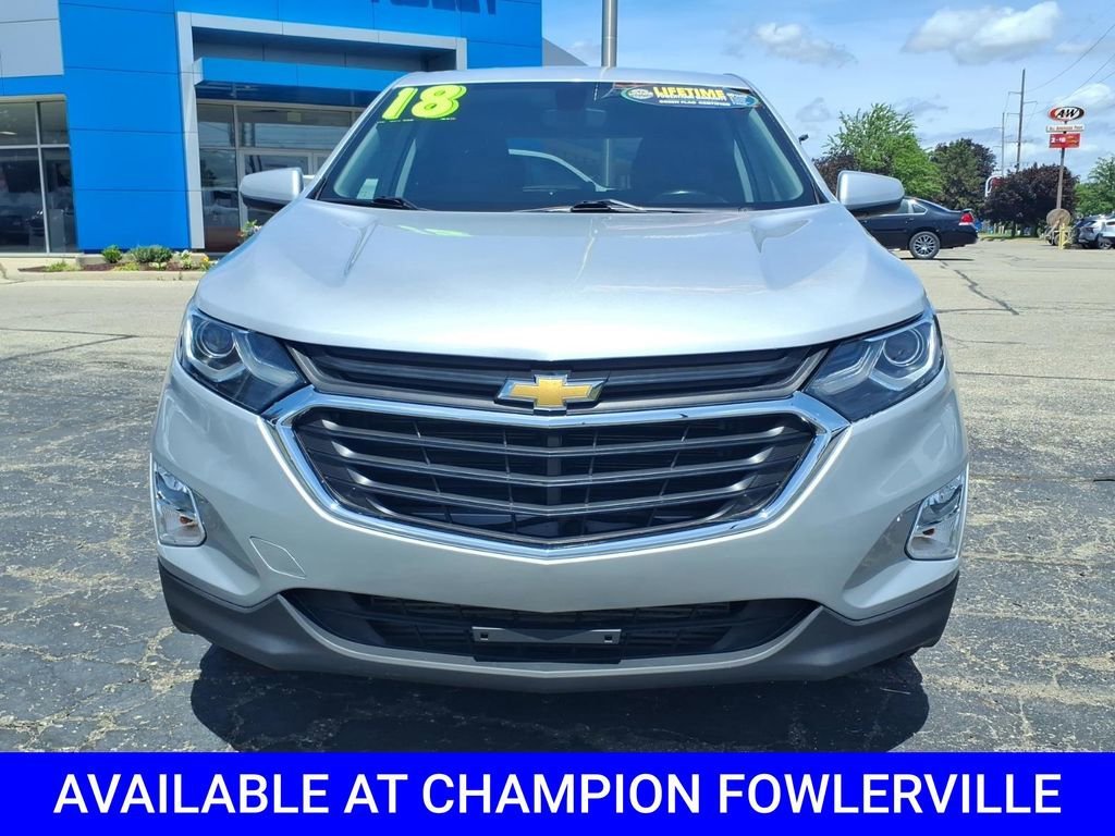 Used 2018 Chevrolet Equinox LT with VIN 2GNAXJEV1J6299458 for sale in Fowlerville, MI