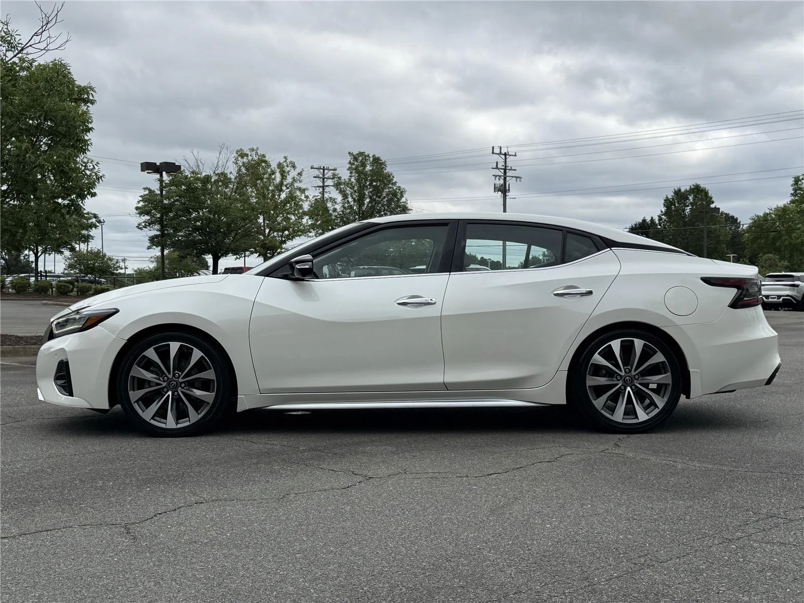 Used 2023 Pearl White Tricoat Nissan Platinum image 23