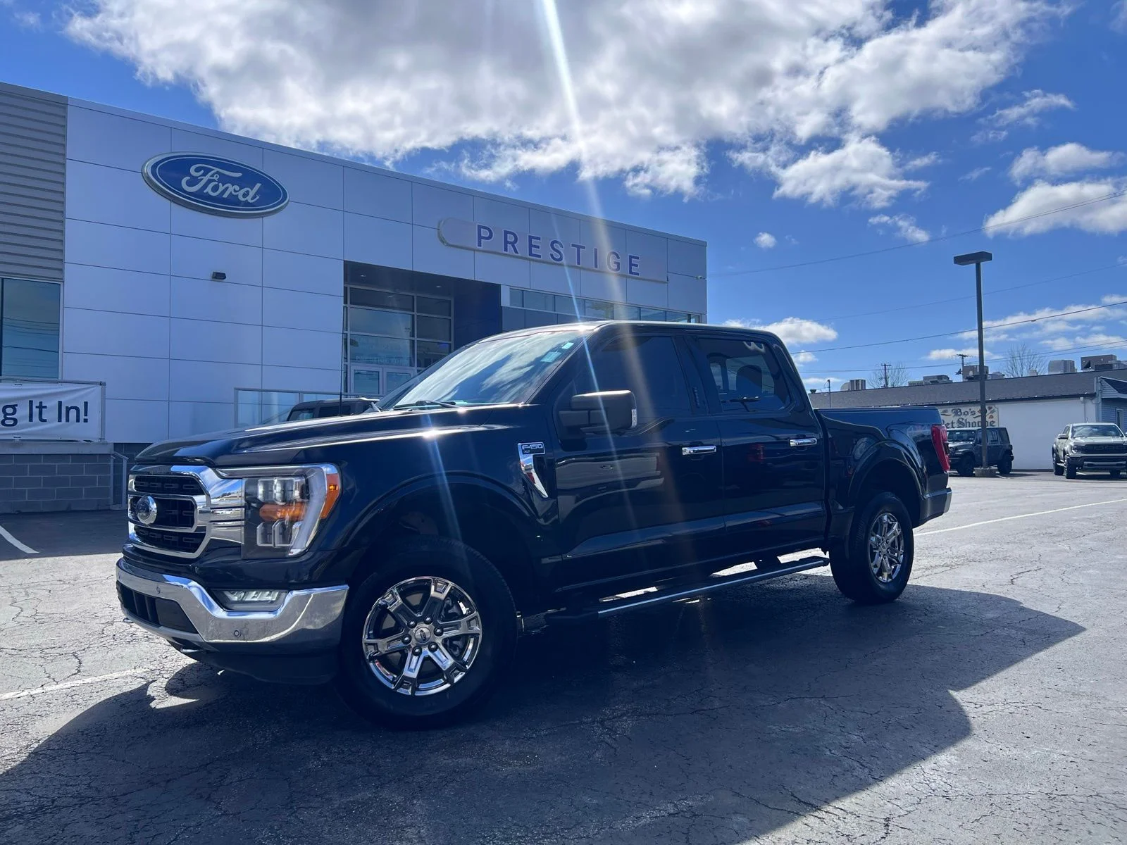 Used 2021 Agate Black Metallic Ford XLT image 1