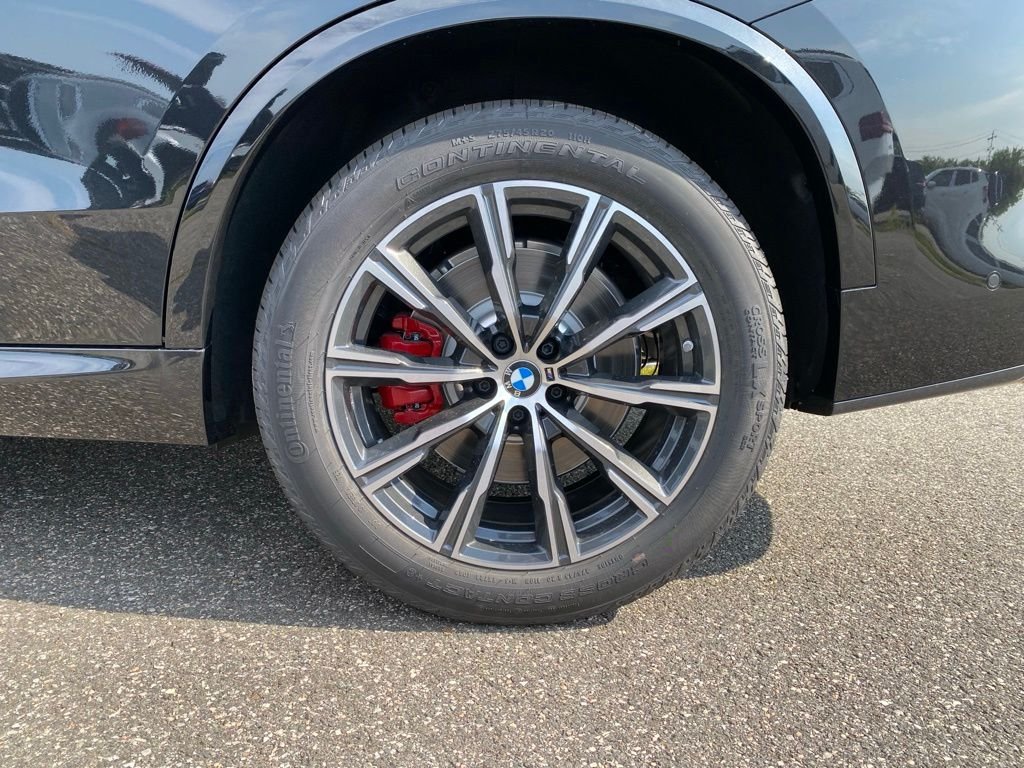 New 2026 Black Sapphire Metallic BMW xDrive50e image 5