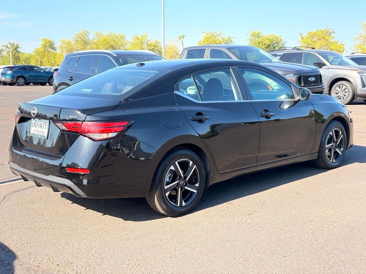 Used 2024 Super Black Nissan SV image 4