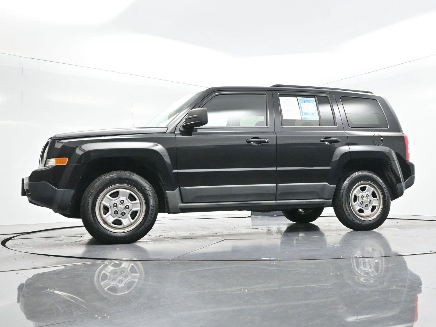 Used 2011 Brilliant Black Crystal Pearl Jeep Sport image 37