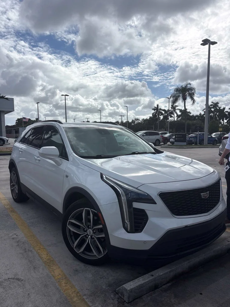 Used 2019 Crystal White Tricoat Cadillac Sport image 1