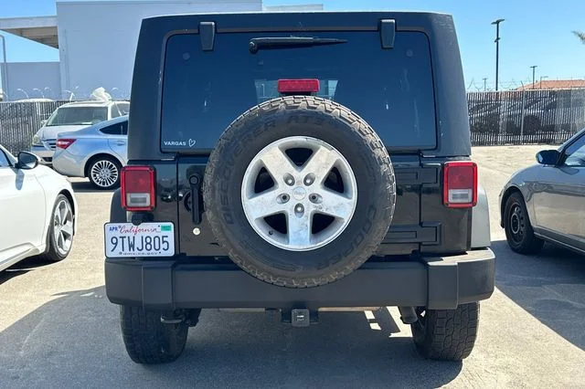 Used 2015 Black Clearcoat Jeep Unlimited Sport image 6