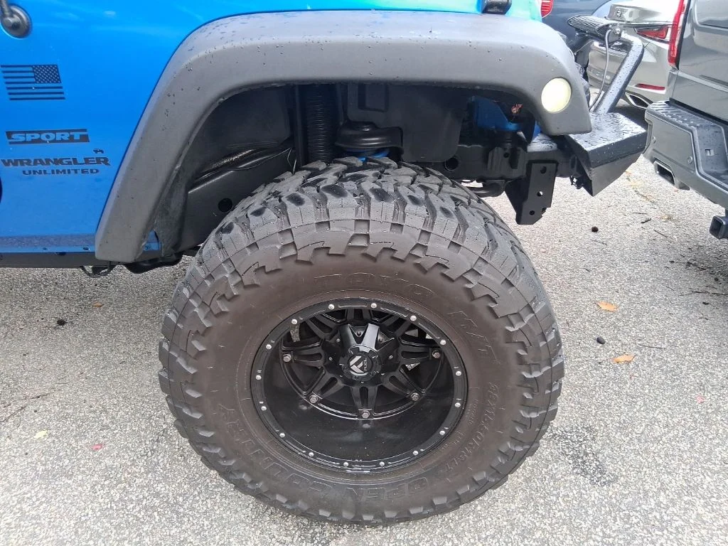 Used 2015 Blue Jeep Unlimited Sport image 5