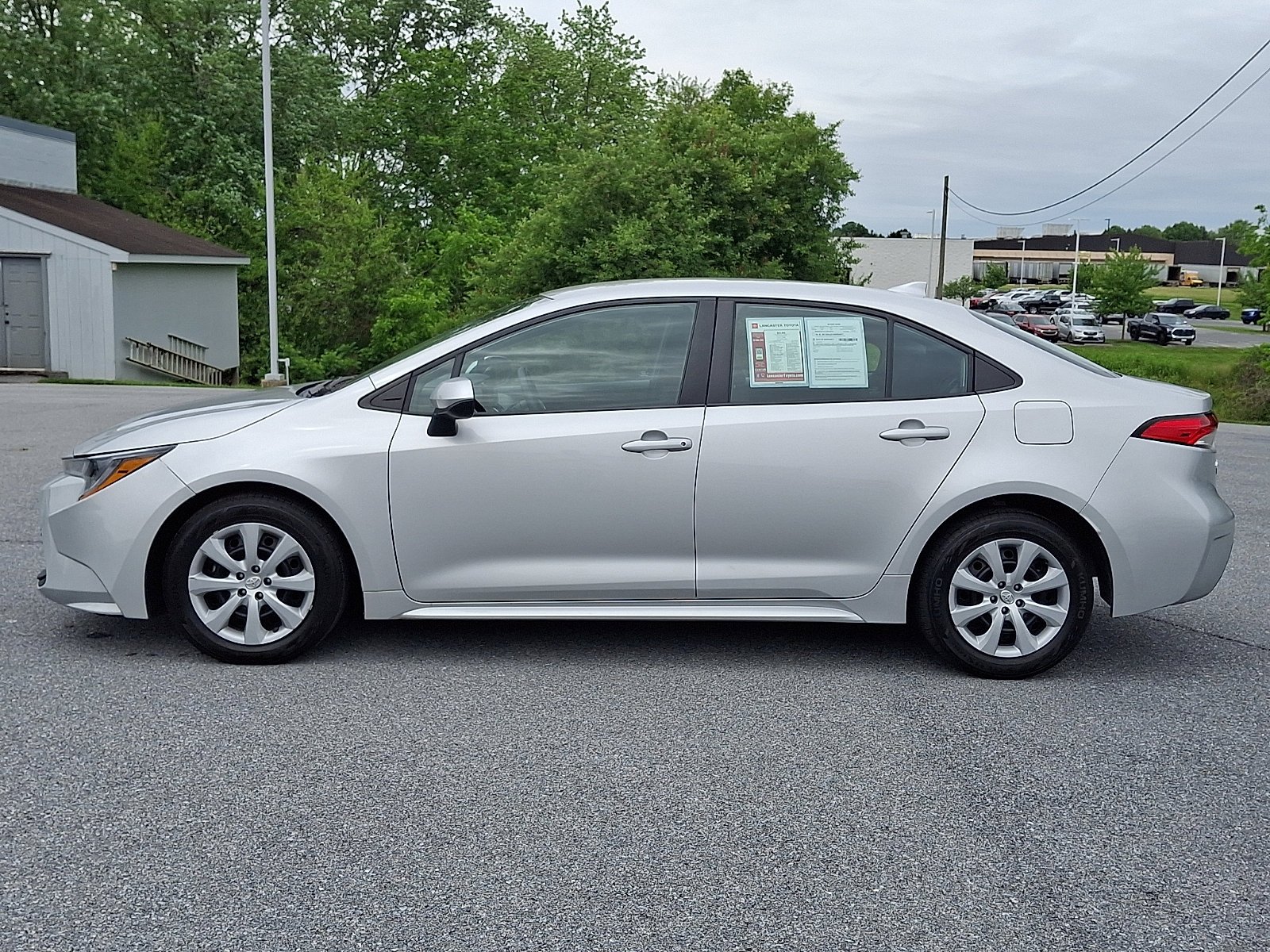 Used 2023 Classic Silver Metallic Toyota LE image 4