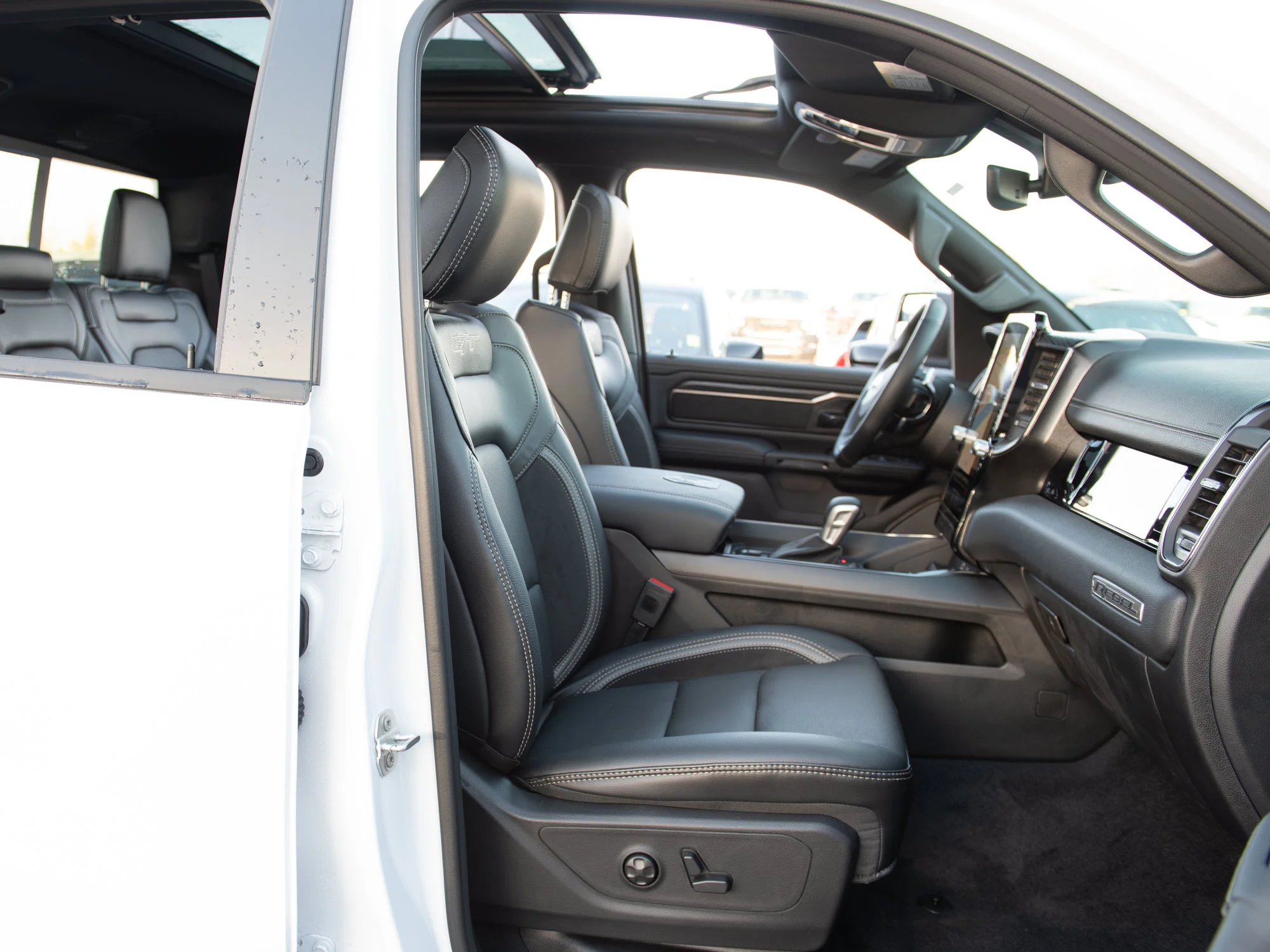New 2026 White RAM Rebel G/T* Crew Cab 4x4, Pano Sunroof, Passive Cold End Exhaust, Passenger Screen image 28