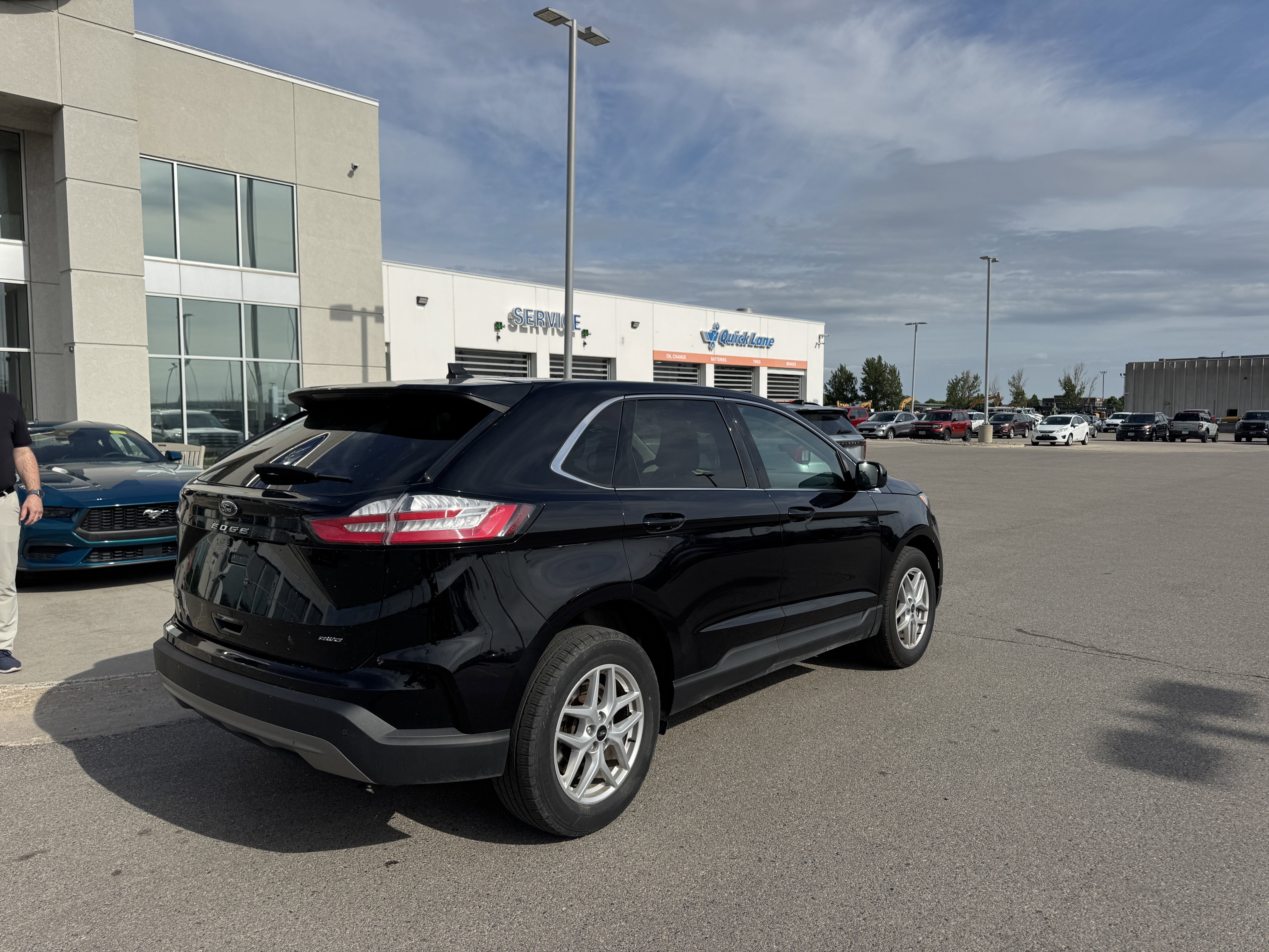 Certified Used 2024 Agate Black Metallic Ford SEL image 4