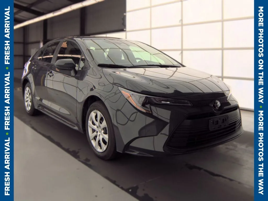 Used 2025 Black Toyota LE image 1