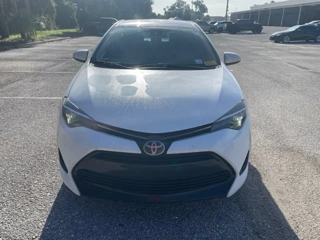 Used 2019 Super White Toyota LE image 6