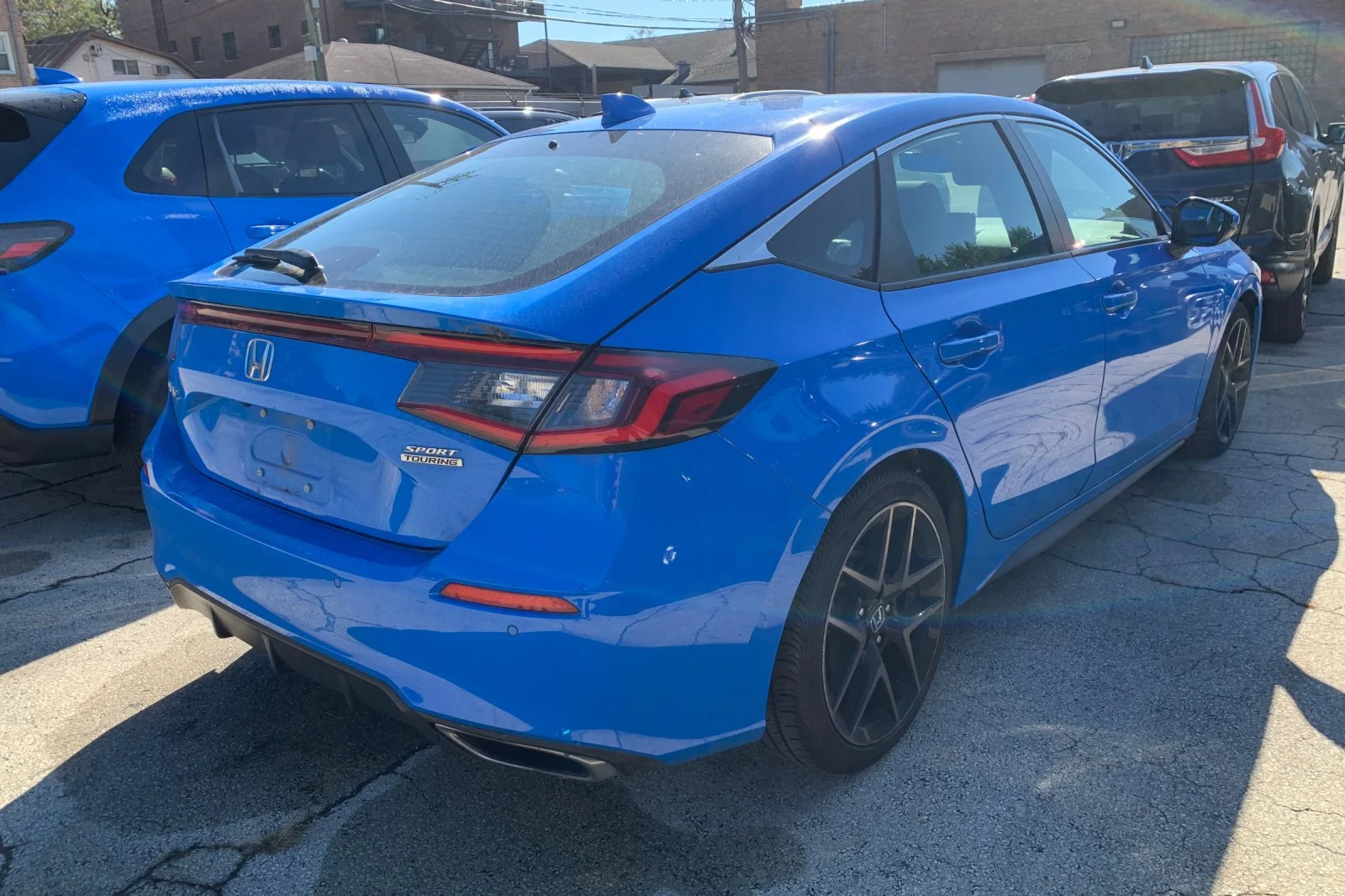 Certified Used 2024 Boost Blue Pearl Honda Sport Touring image 2