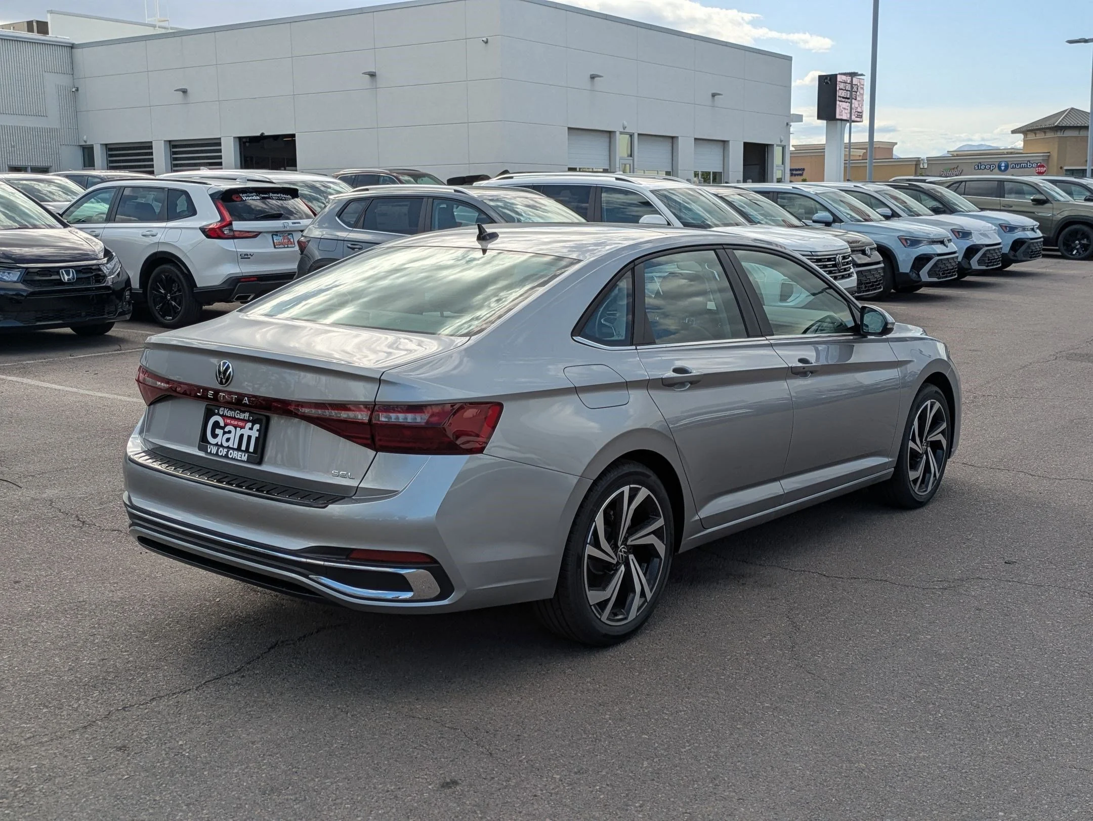 New 2026 Pyrite Silver Metallic Volkswagen SEL image 3