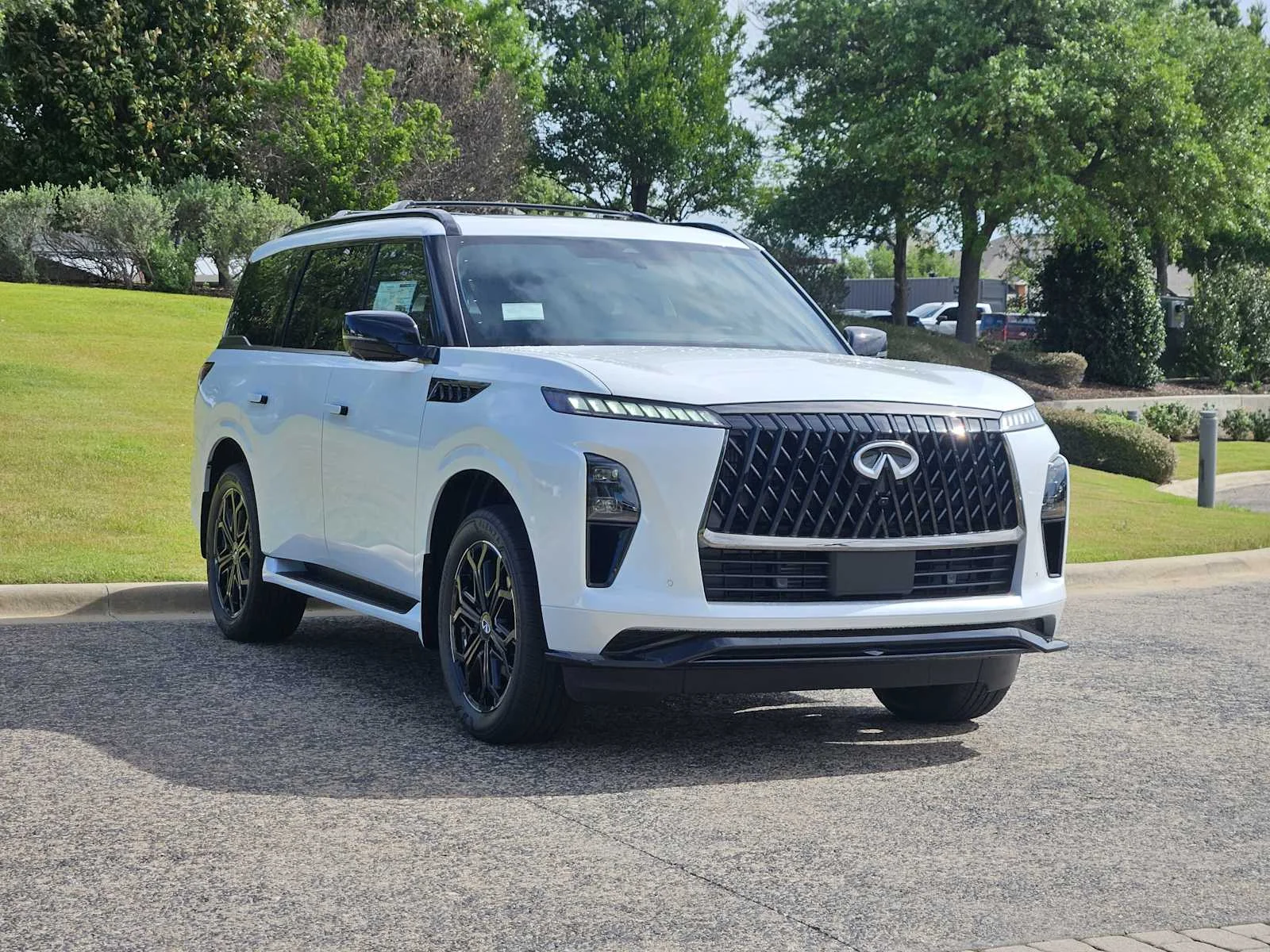 New 2026 RADIANT WHITE INFINITI Sport 4WD image 2
