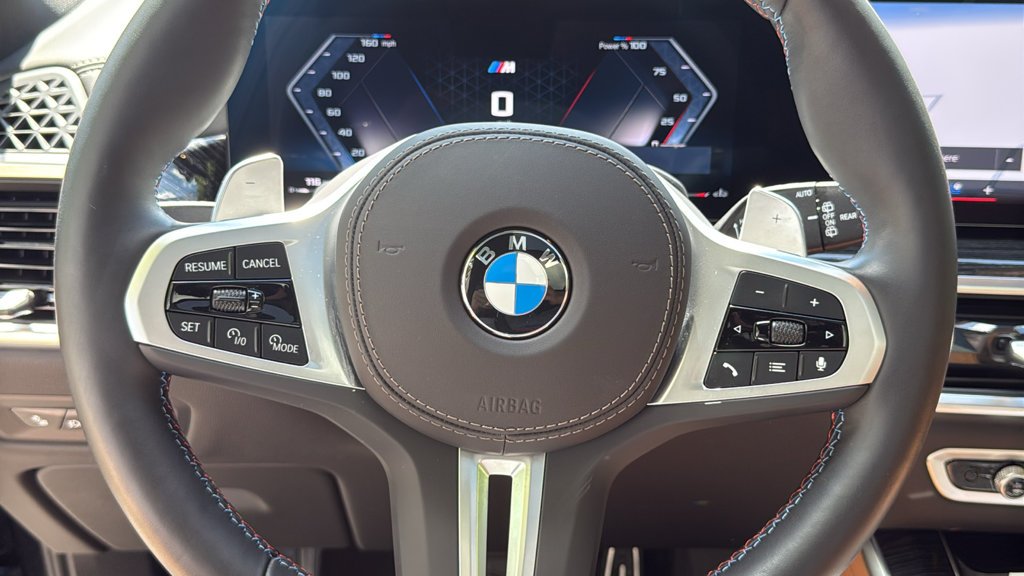 Used 2026 Black Sapphire Metallic BMW M60i image 12
