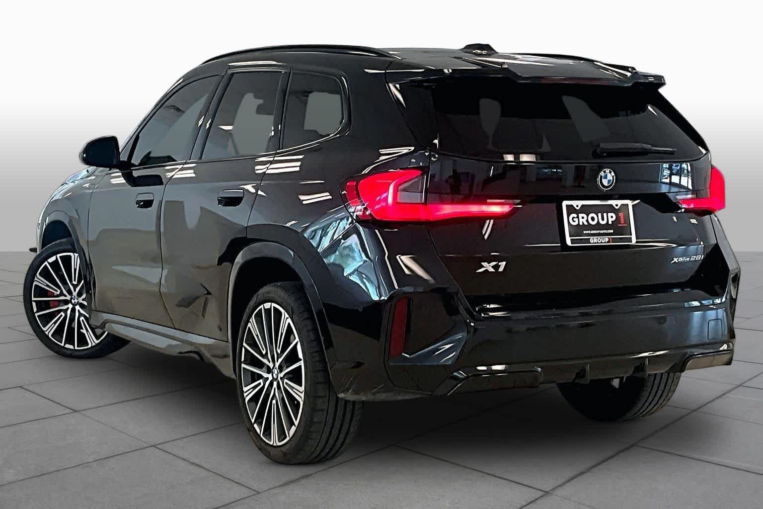 Used 2024 Black Sapphire Metallic BMW xDrive28i image 11