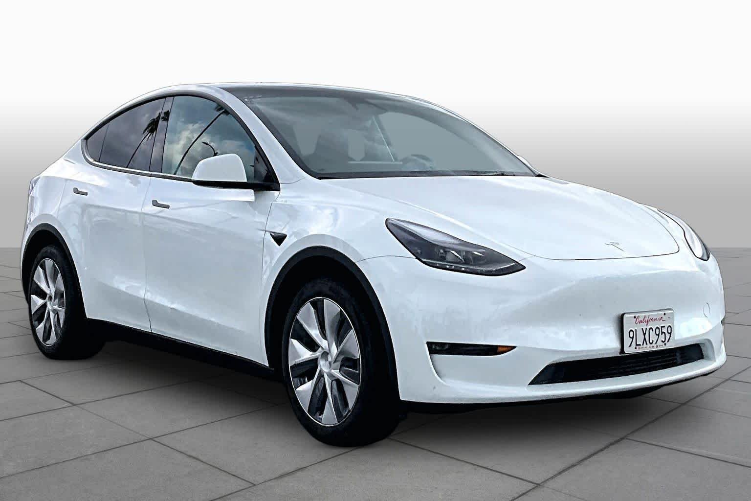 Used 2024 Tesla Model Y Long Range with VIN 7SAYGDEE2RA258223 for sale in Tustin, CA