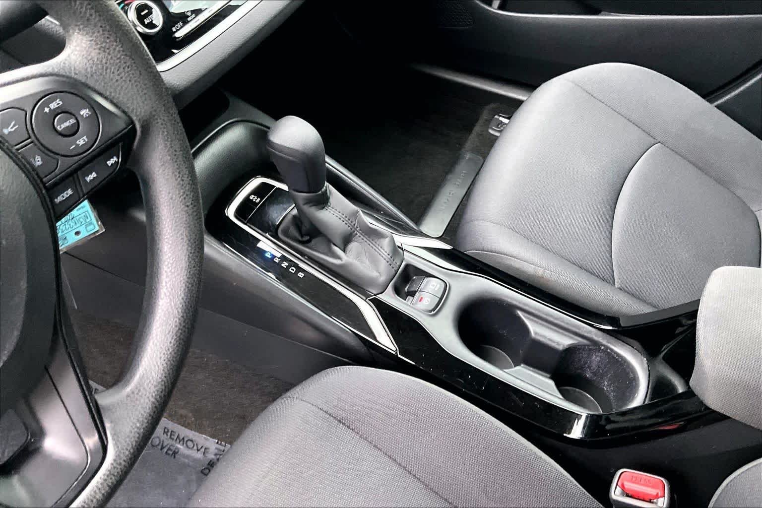Used 2021 Super White Toyota LE image 17
