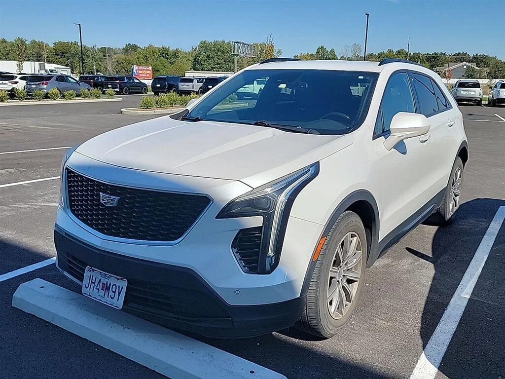 Used 2019 Crystal White Tricoat Cadillac AWD Sport image 1