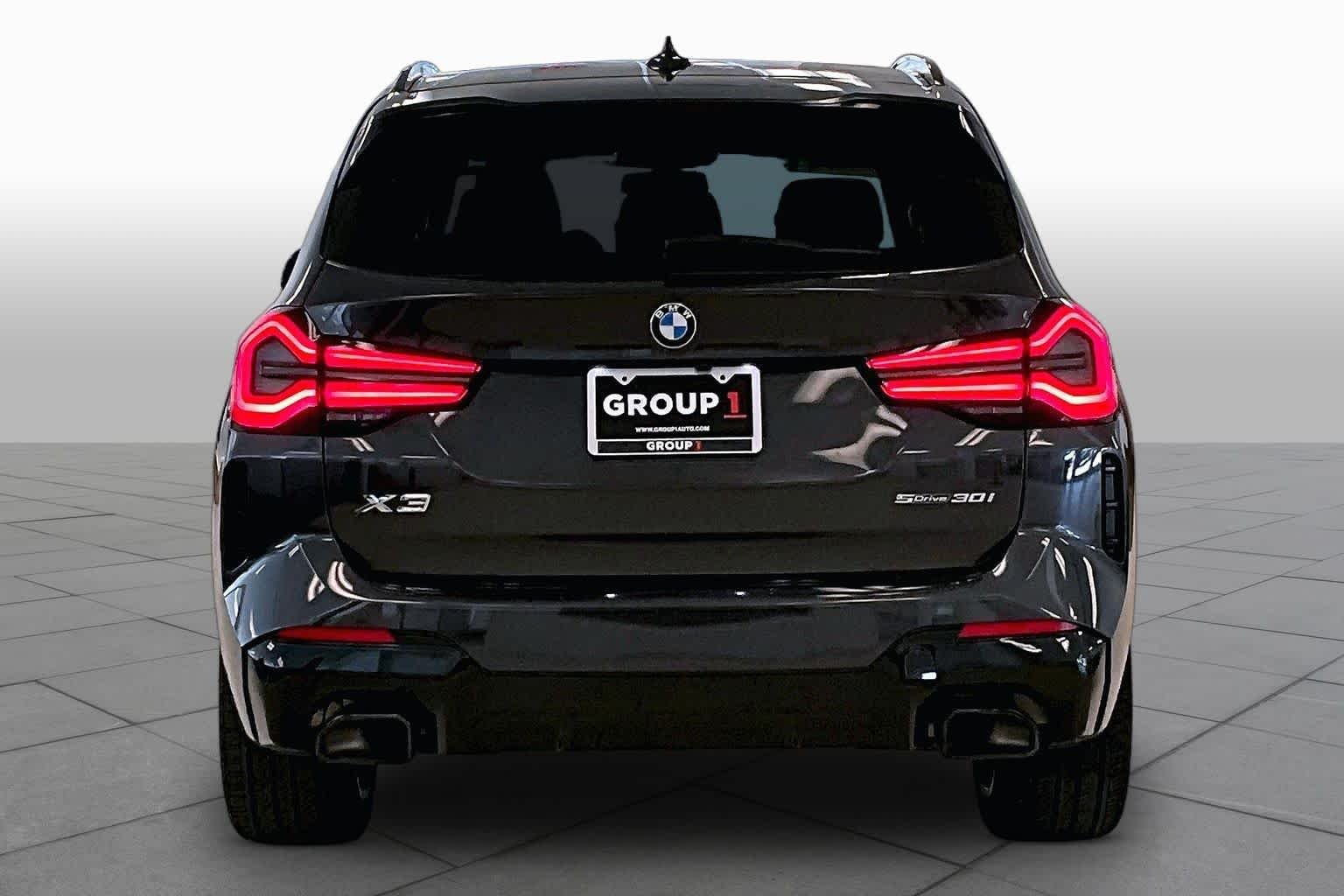 Used 2023 Dark Graphite Metallic BMW sDrive30i image 4