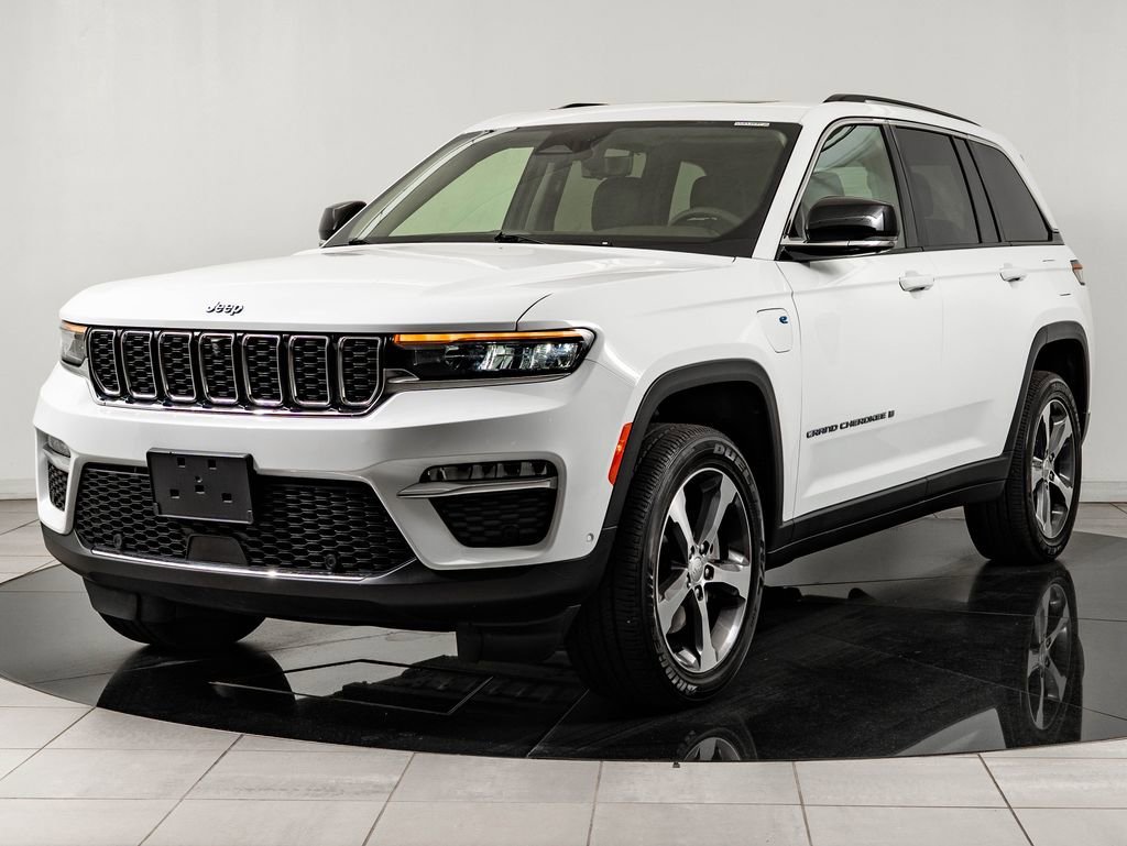 Used 2022 Bright White Clearcoat Jeep 4xe image 1