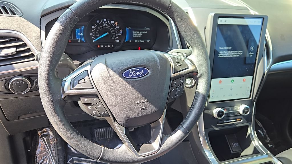 Used 2024 Black Metallic Ford Titanium image 11