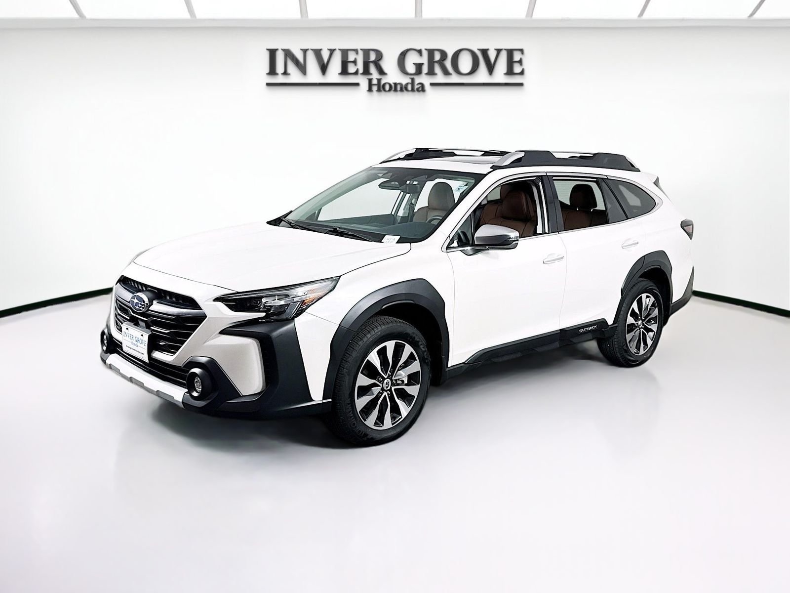 Used 2024 Crystal White Pearl Subaru Touring image 1