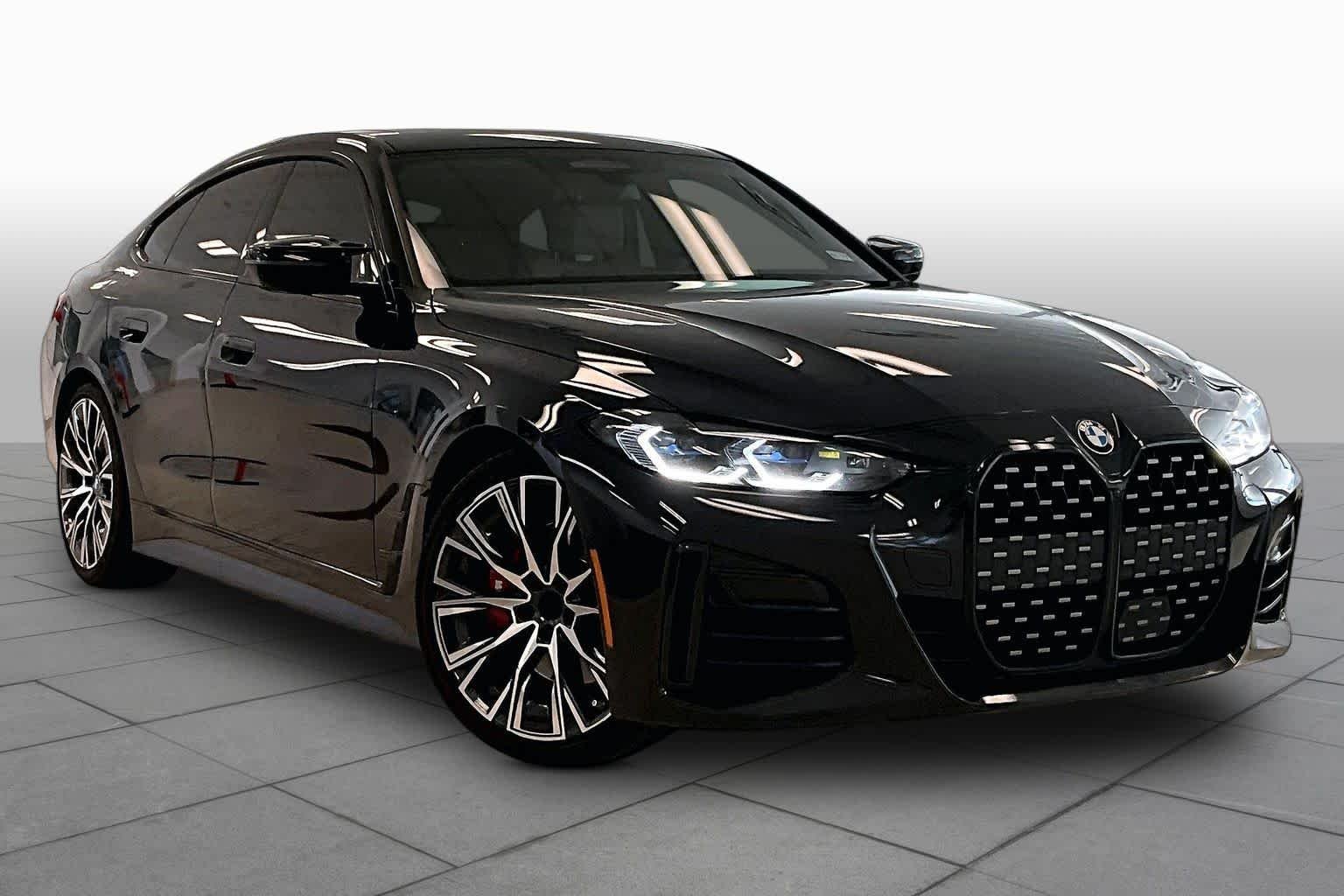 Used 2024 Black Sapphire Metallic BMW M440i image 2