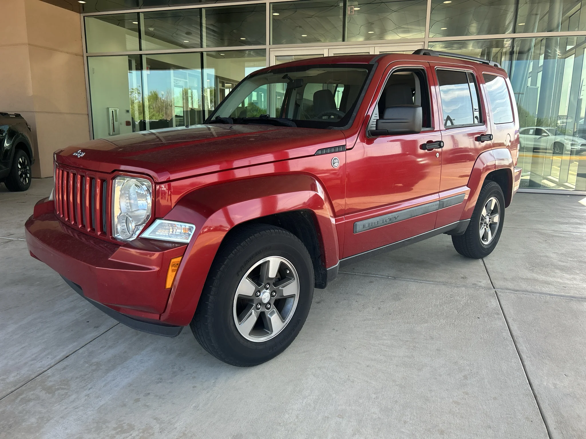 Used 2008 Inferno Red Crystal Pearlcoat Jeep Sport image 9
