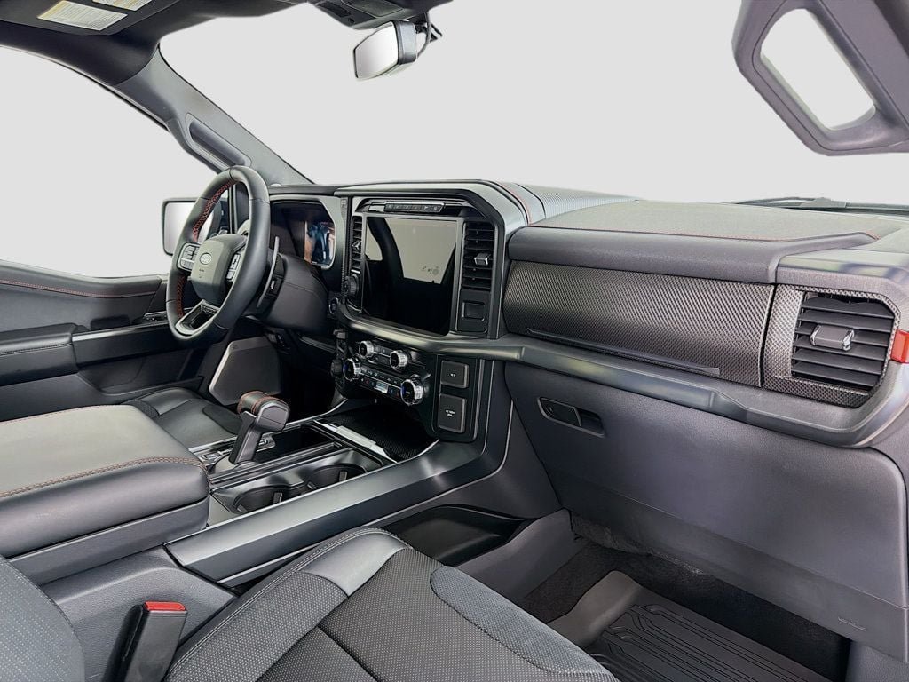 Used 2024 Antimatter Blue Metallic Ford Raptor 4WD SuperCrew 5.5