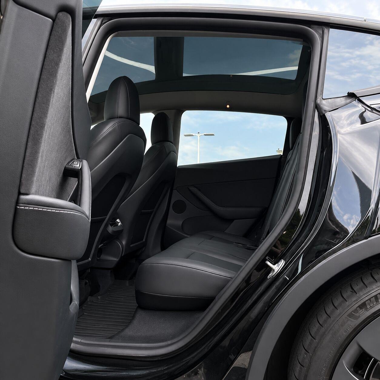 Used 2022 Solid Black Tesla Performance image 12