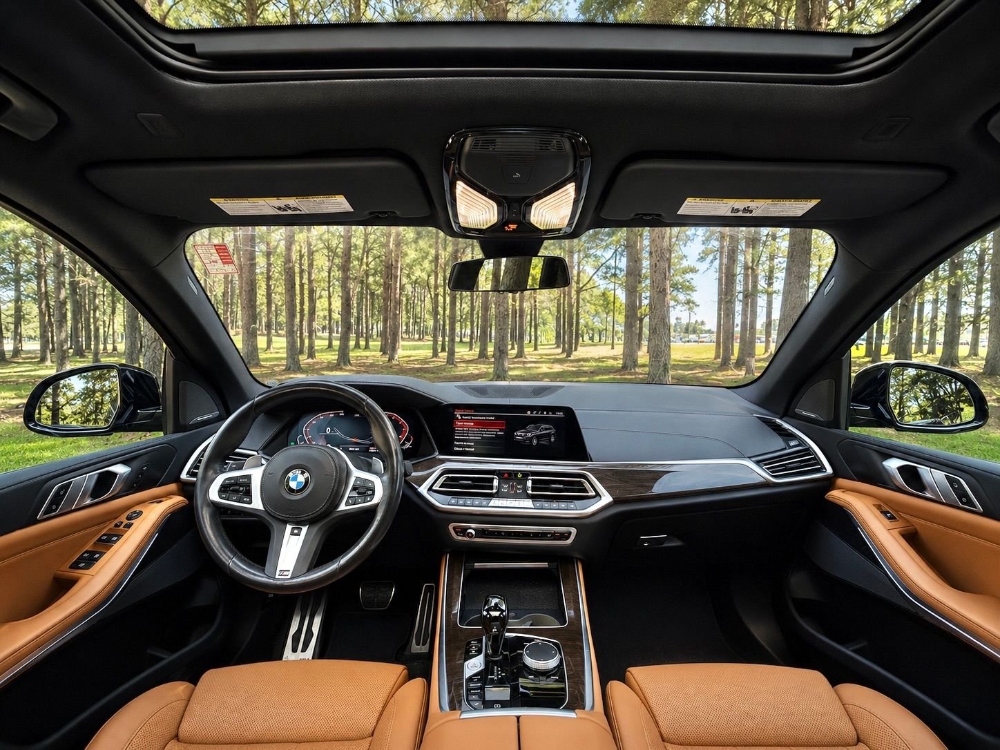 Certified Used 2023 Black Sapphire Metallic BMW xDrive40i image 2