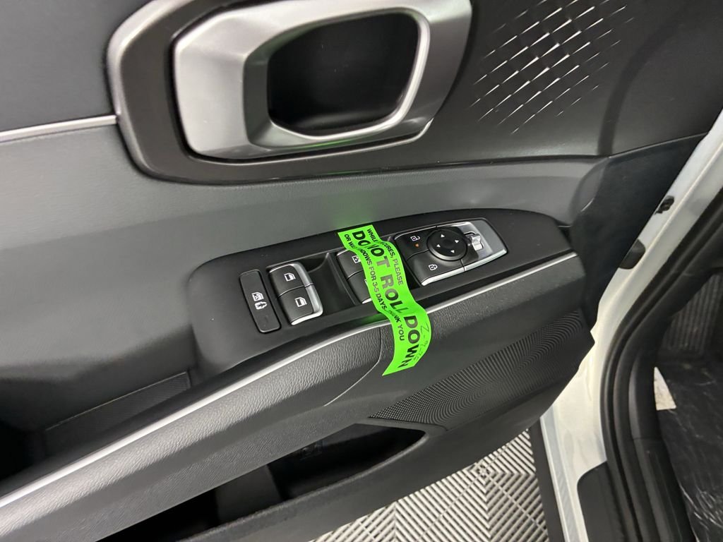 New 2026 Ivory Silver Kia LX image 23