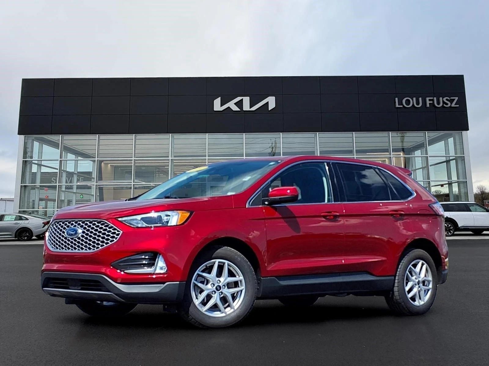 Used 2024 Rapid Red Metallic Tinted Clearcoat Ford SEL image 1