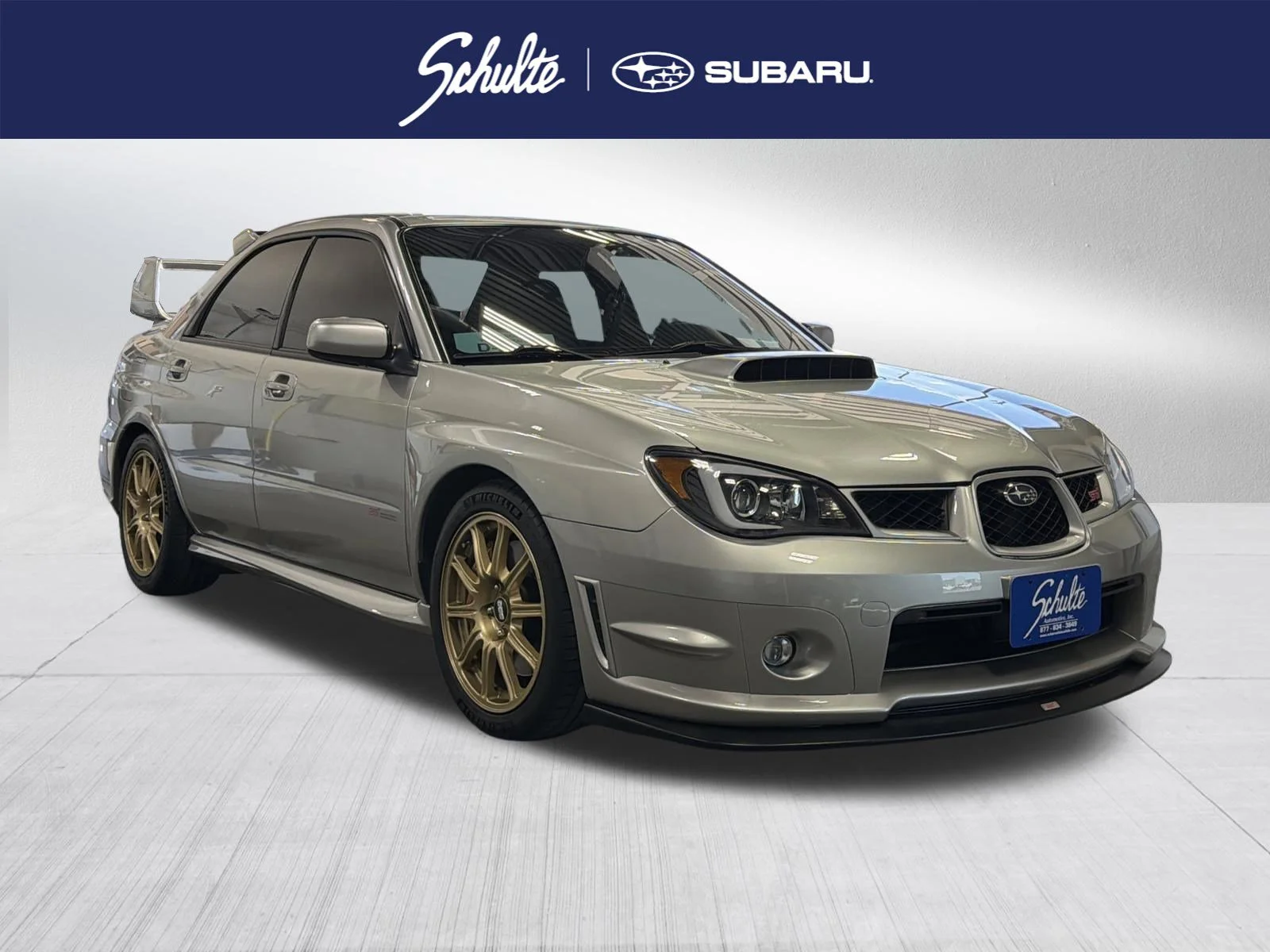 2006 Subaru Impreza WRX STI- GOLD WHEELS's photo