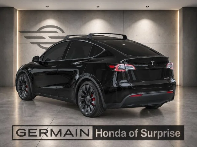 Used 2023 Solid Black Tesla Performance image 4