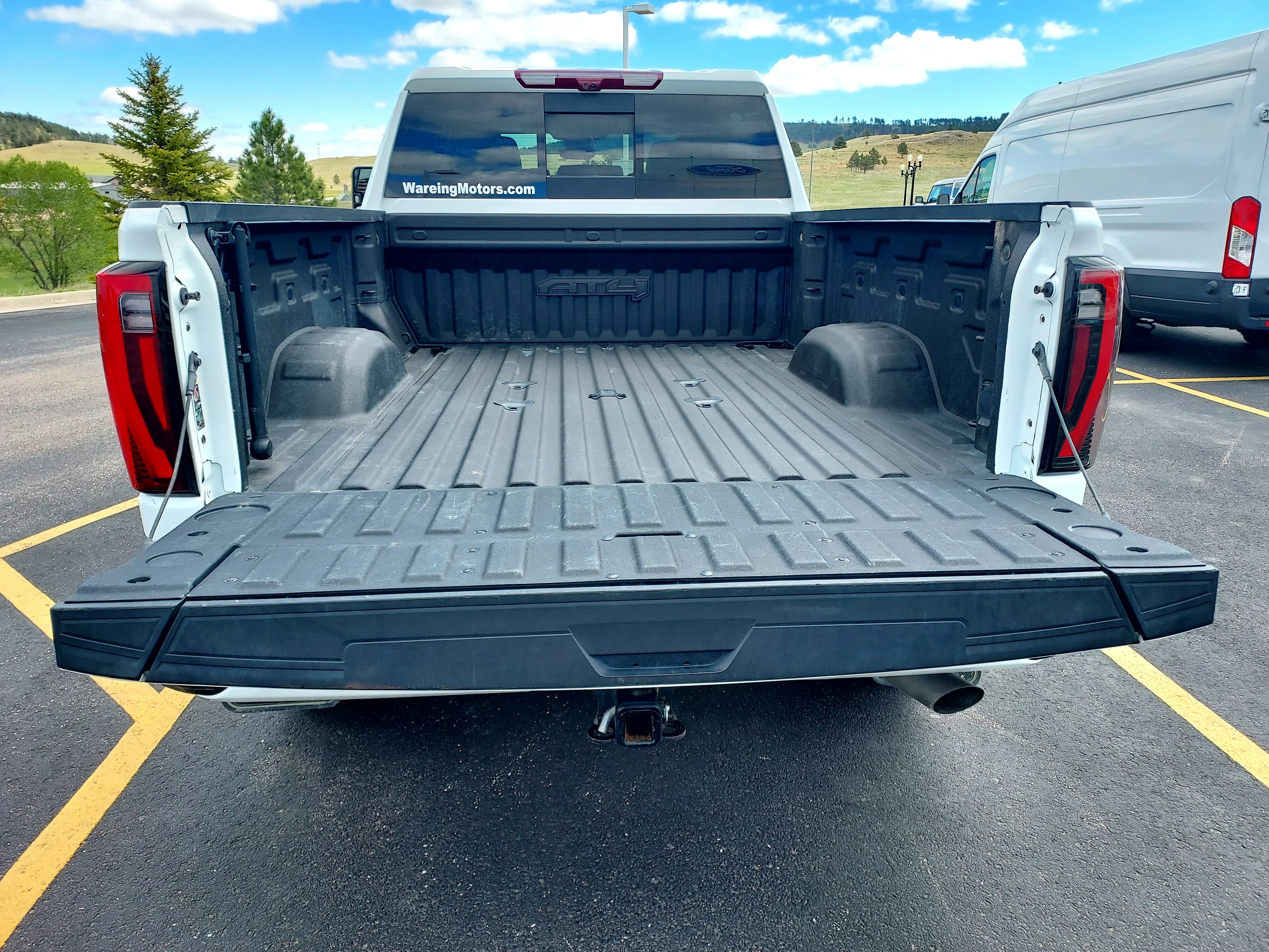 Used 2024 Summit White GMC AT4 image 7
