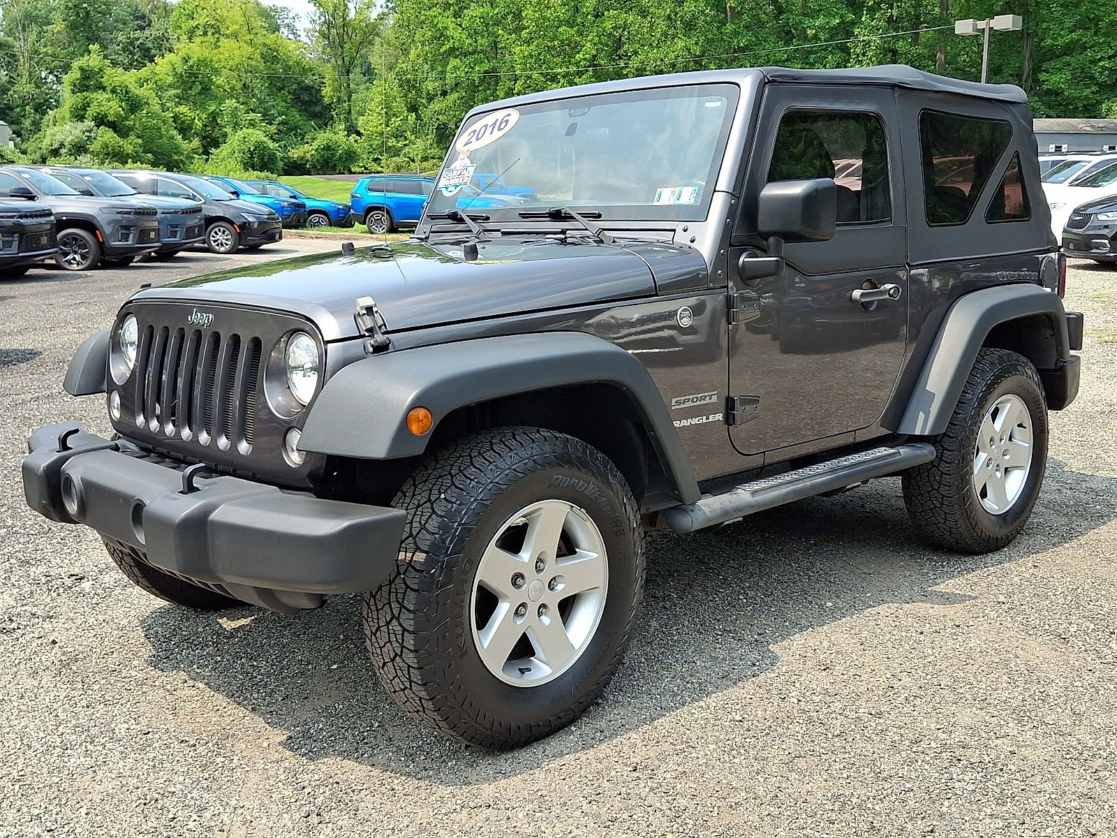 Used 2016 Granite Crystal Metallic Clearcoat Jeep Sport image 3