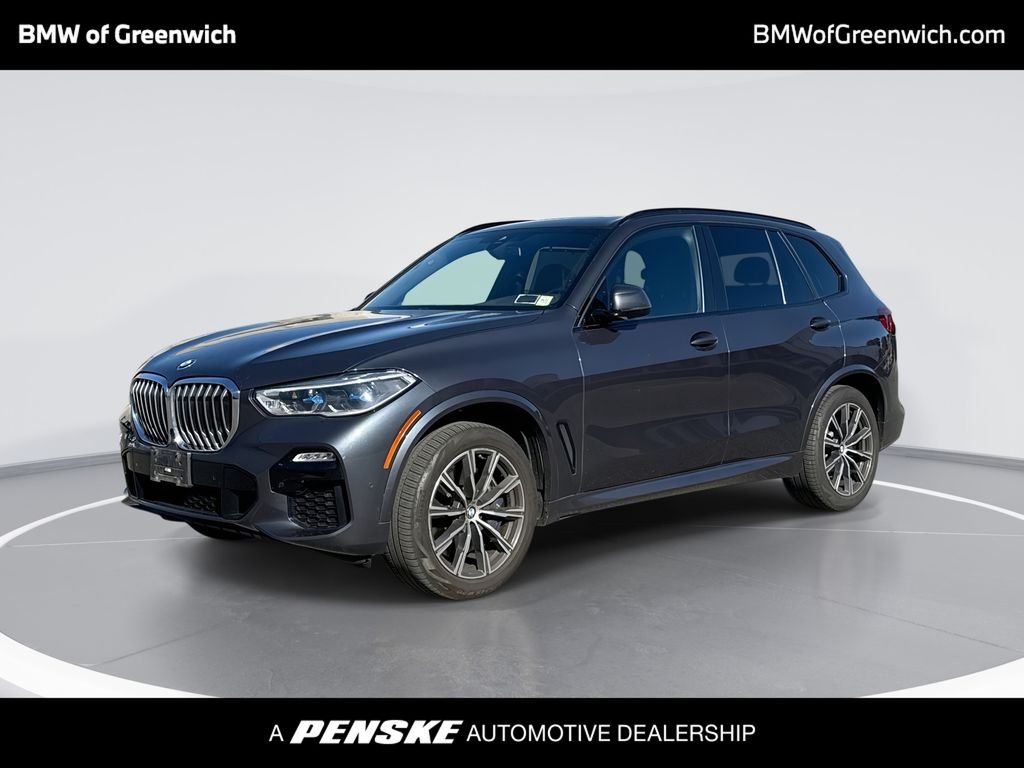 Used 2019 Gray Metallic BMW xDrive40i image 1