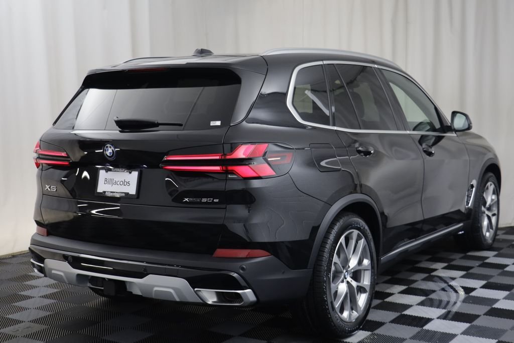 New 2026 Black Sapphire Metallic BMW xDrive50e image 18