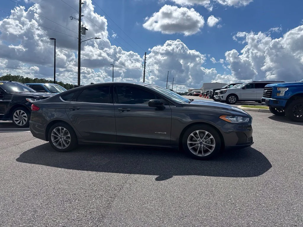 Used 2019 Magnetic Metallic Ford SE image 1