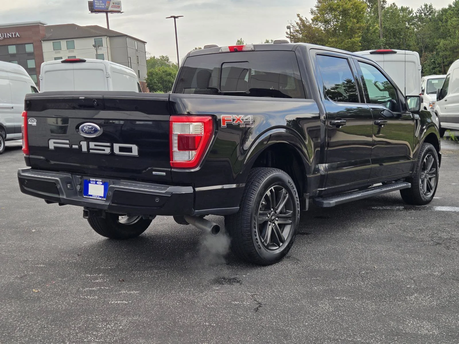 Used 2021 Black Metallic Ford Lariat image 7