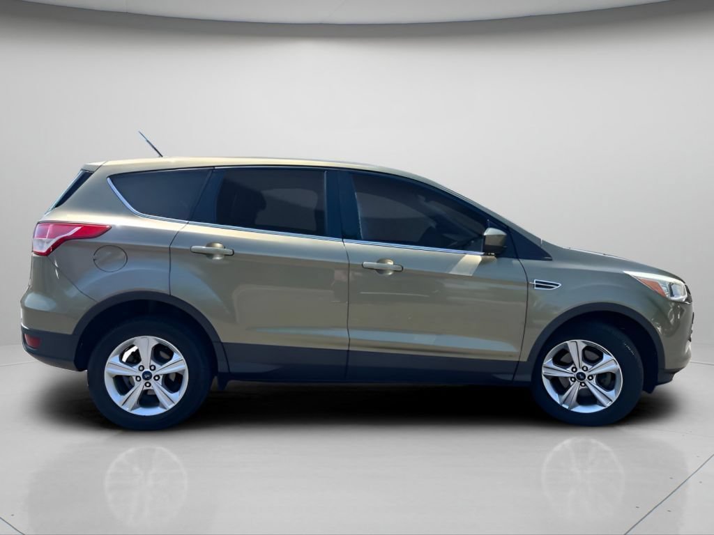 Used 2013 Ginger Ale Metallic Ford SE image 4