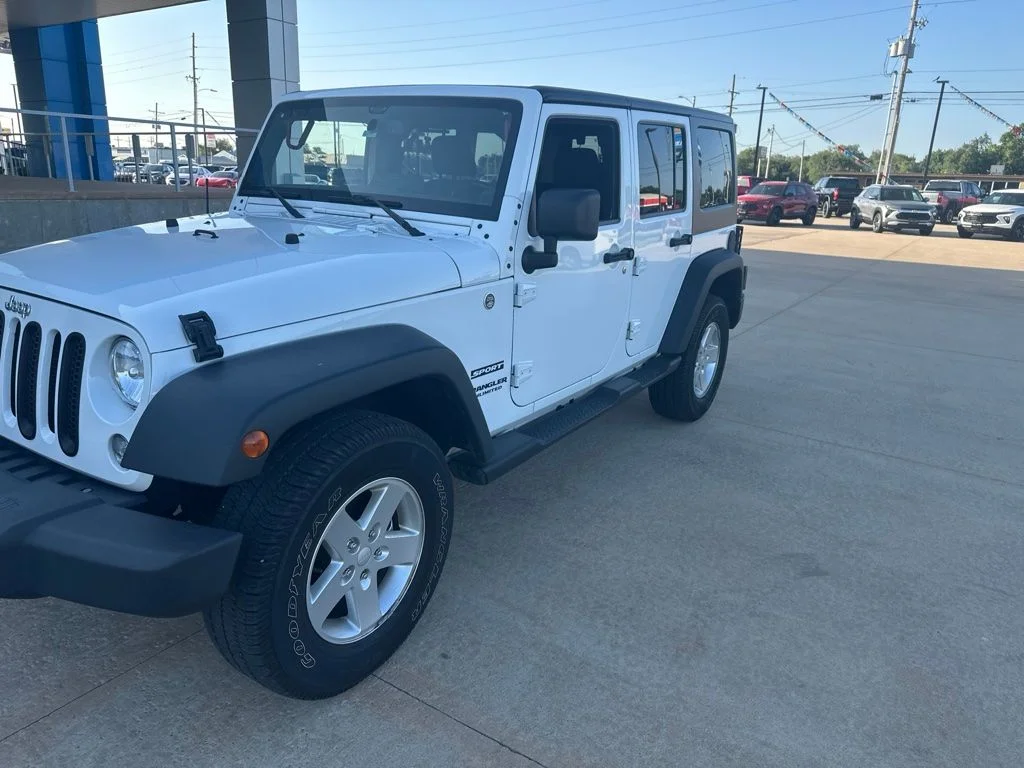 Used 2014 White Jeep Unlimited Sport image 25