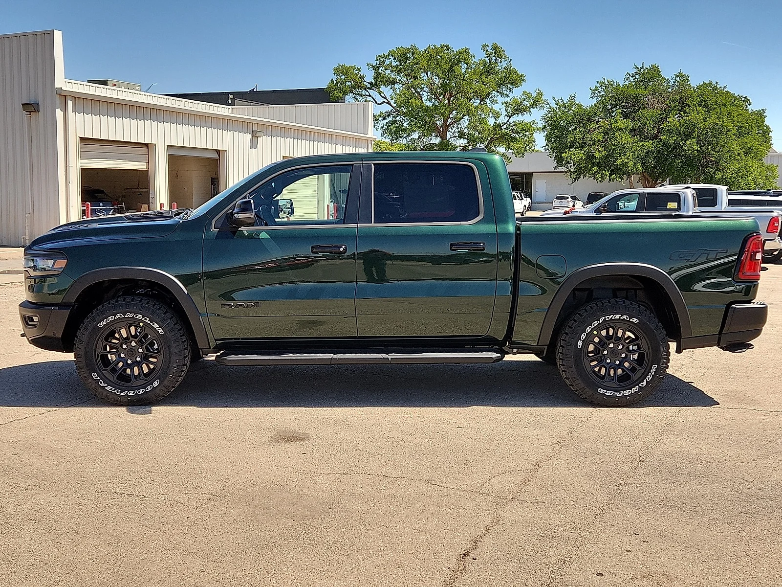 New 2026 Serrano-Green Metallic  Paint Ram REBEL CREW CAB 4X4 5