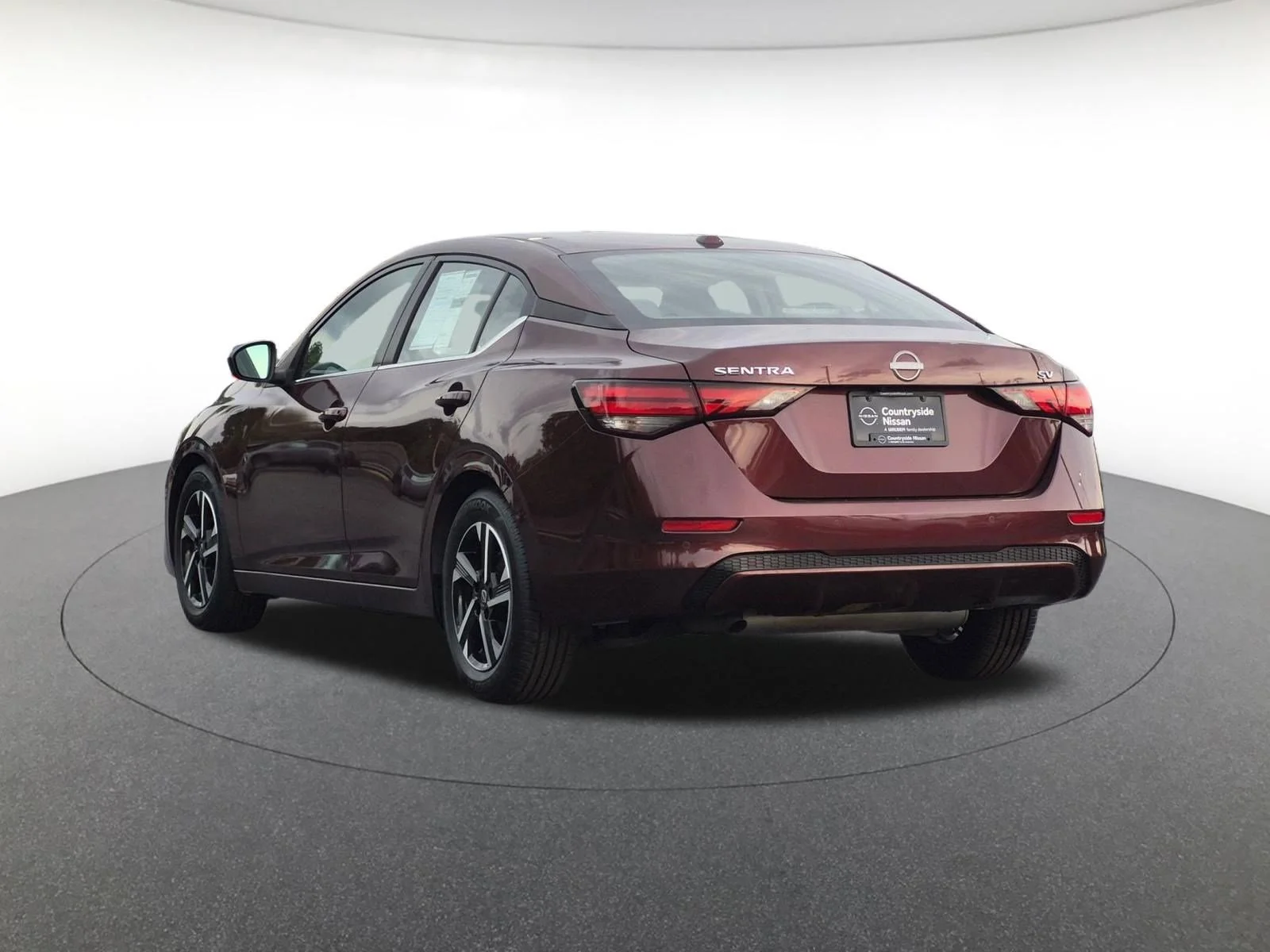 Used 2024 Rosewood Metallic Nissan SV image 7