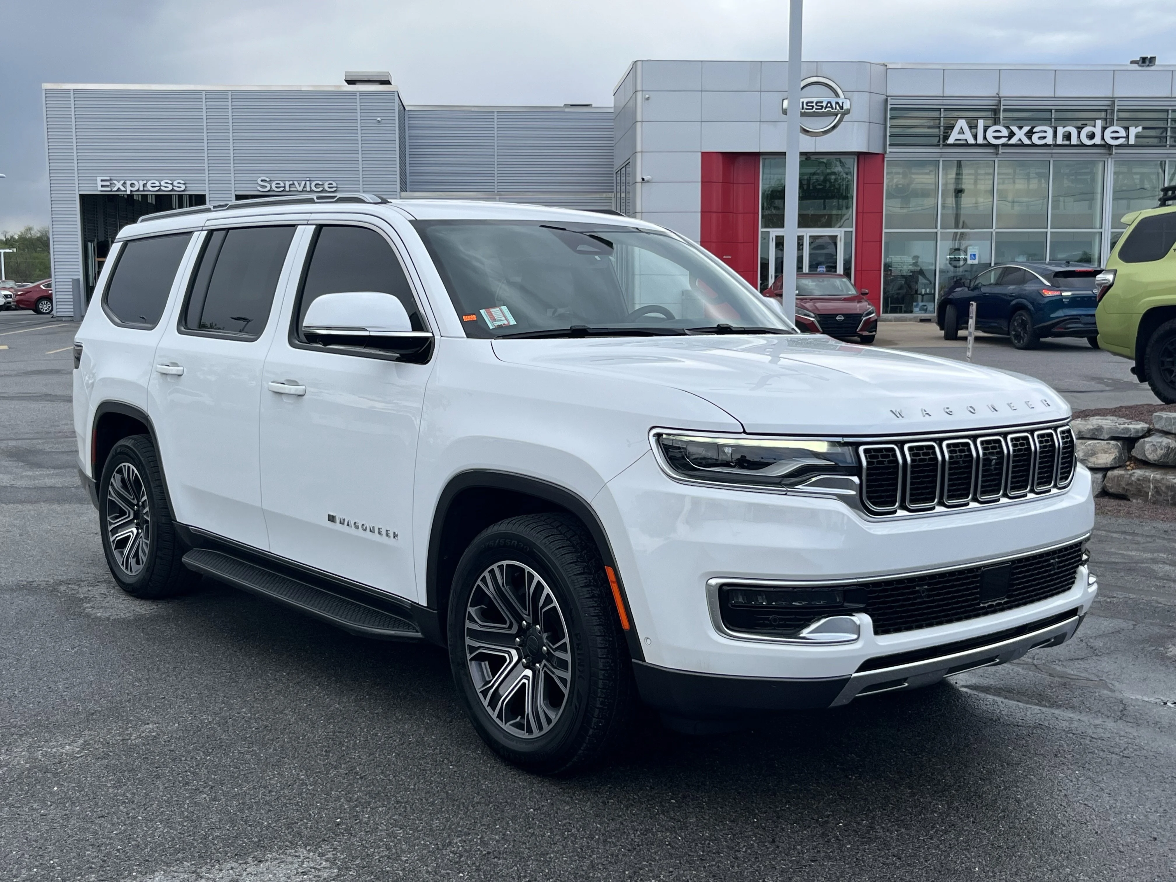 Used 2022 Bright White Clearcoat Jeep Series III image 1