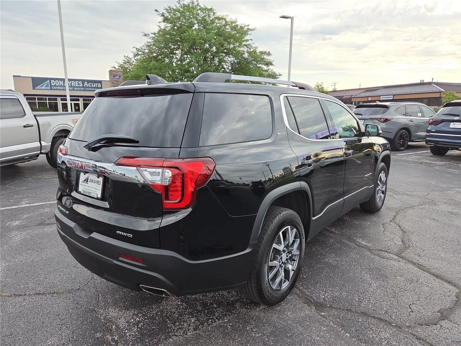 Used 2023 Ebony Twilight Metallic GMC SLT image 31