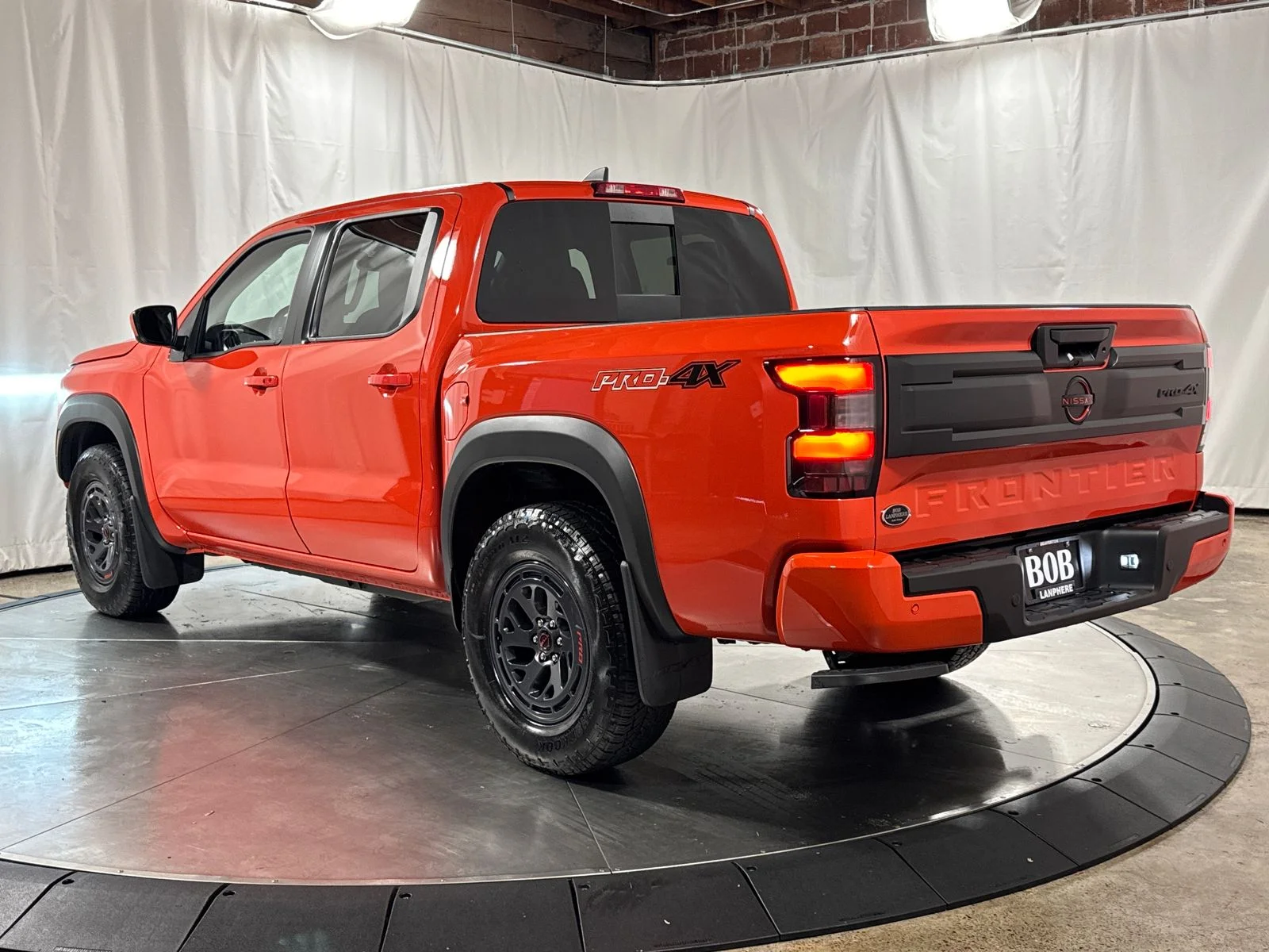 Used 2025 Afterburn Orange Nissan PRO-4X image 9