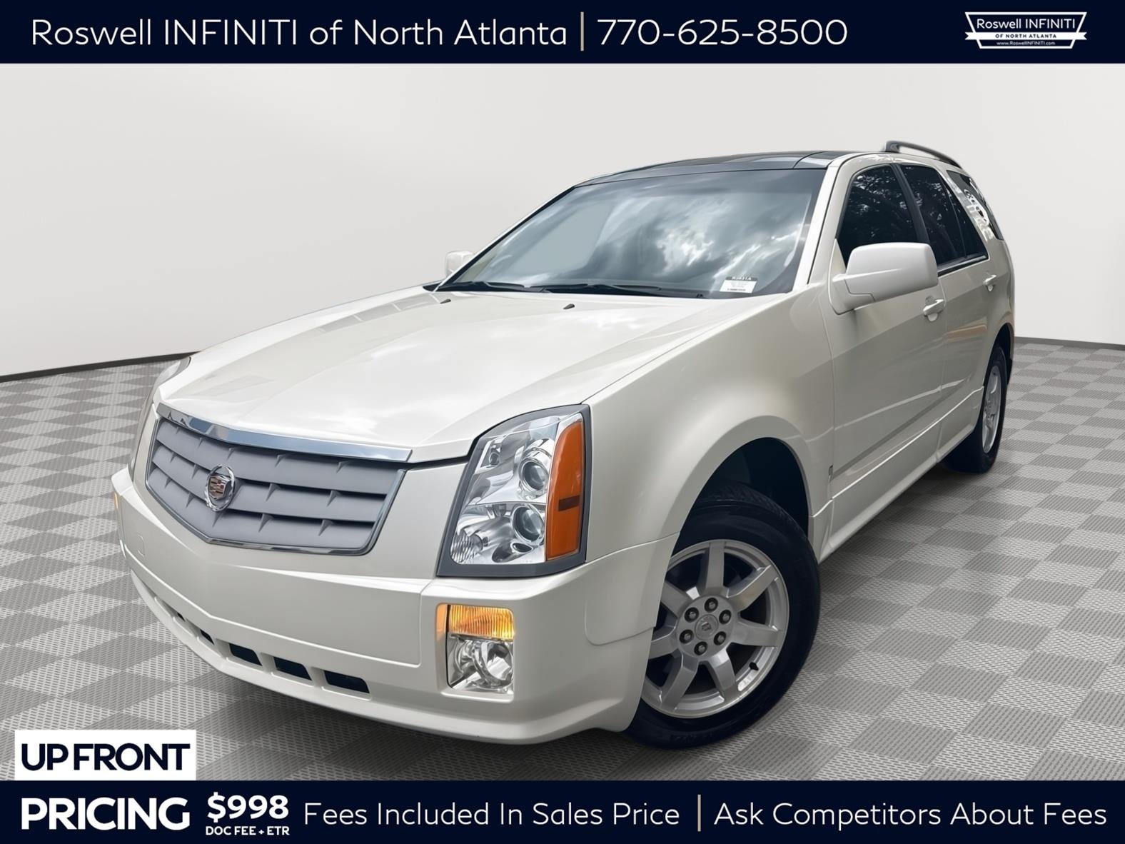Used 2009 White Diamond Tricoat Cadillac AWD image 1